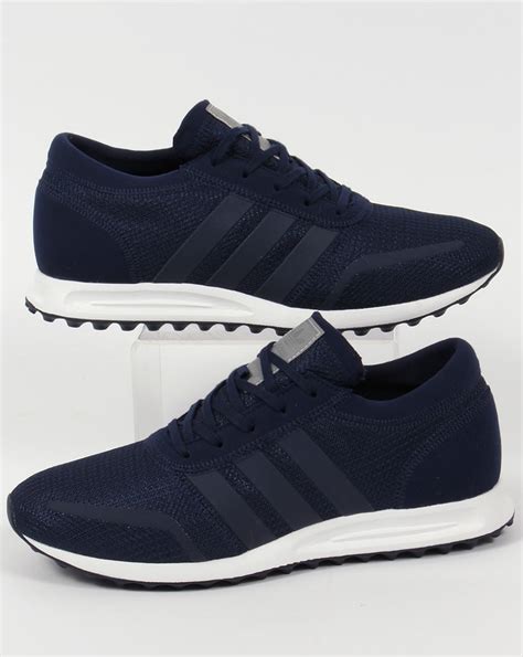 navy blue adidas sneakers.